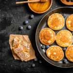 pancakes-in-a-frying-pan-with-fresh-berries-and-ho-2024-09-21-05-37-52-utc_Easy-Resize.com